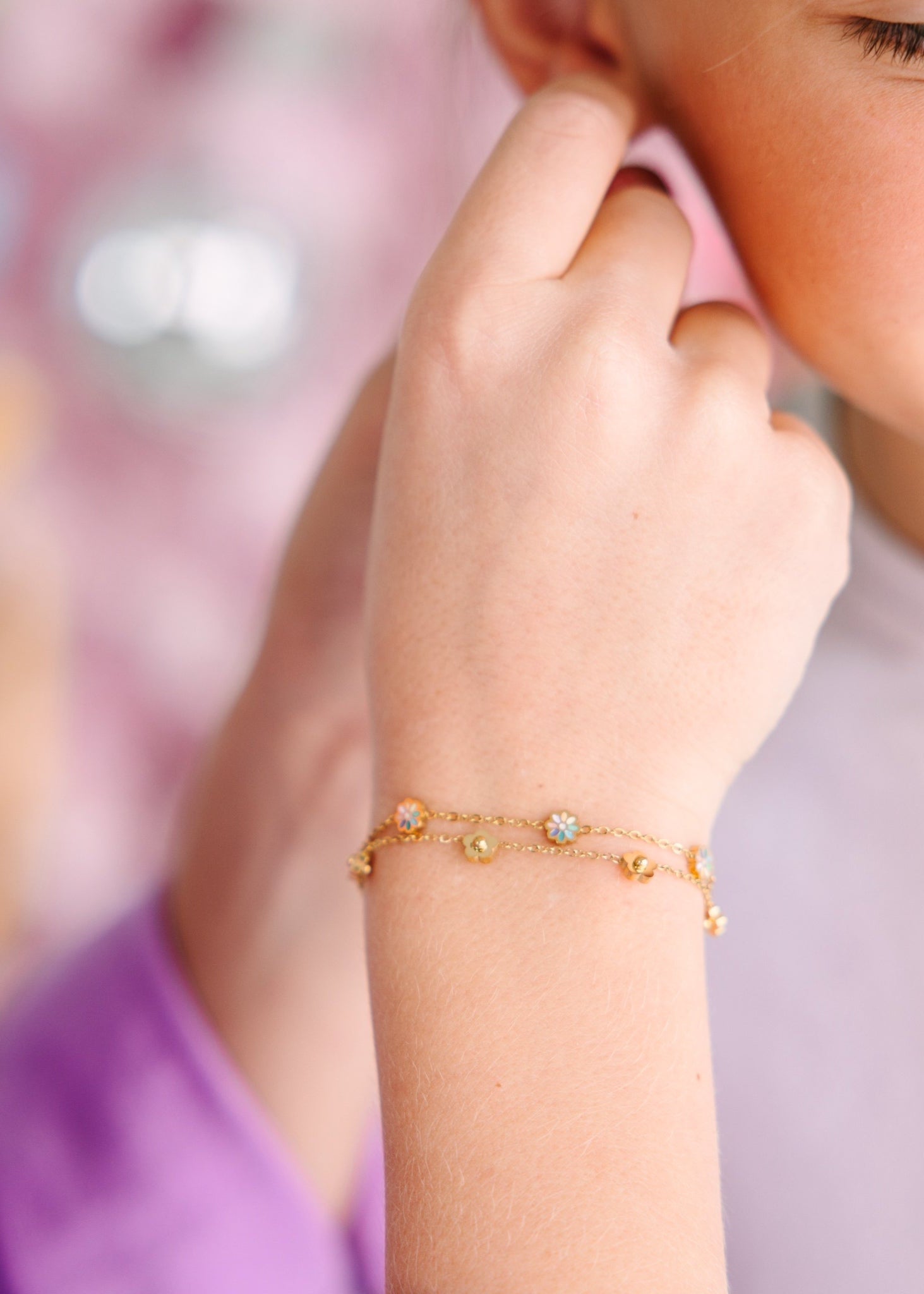 Person wearing Rainbow Daisy Bracelet