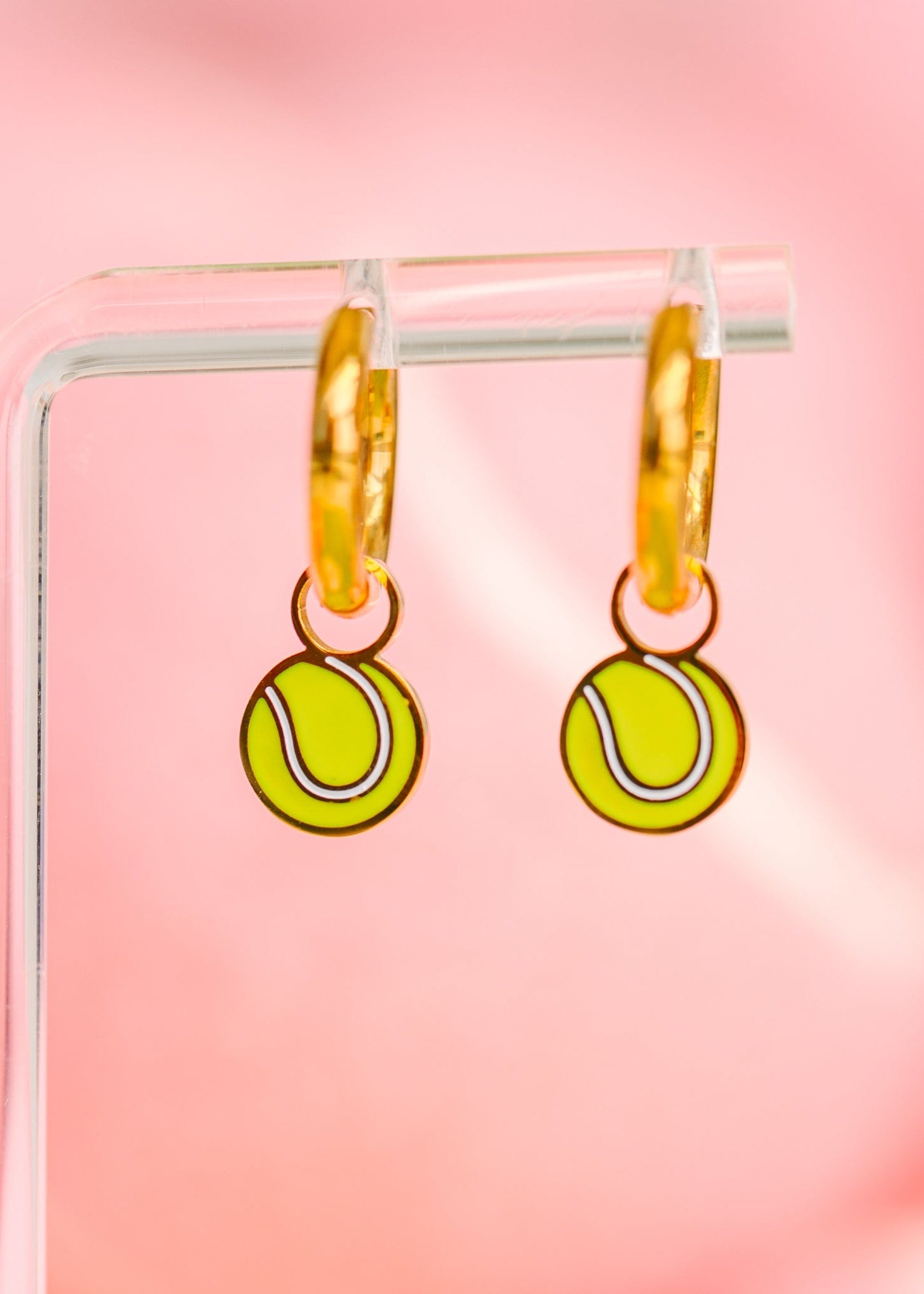 Tenis Charms in earrings