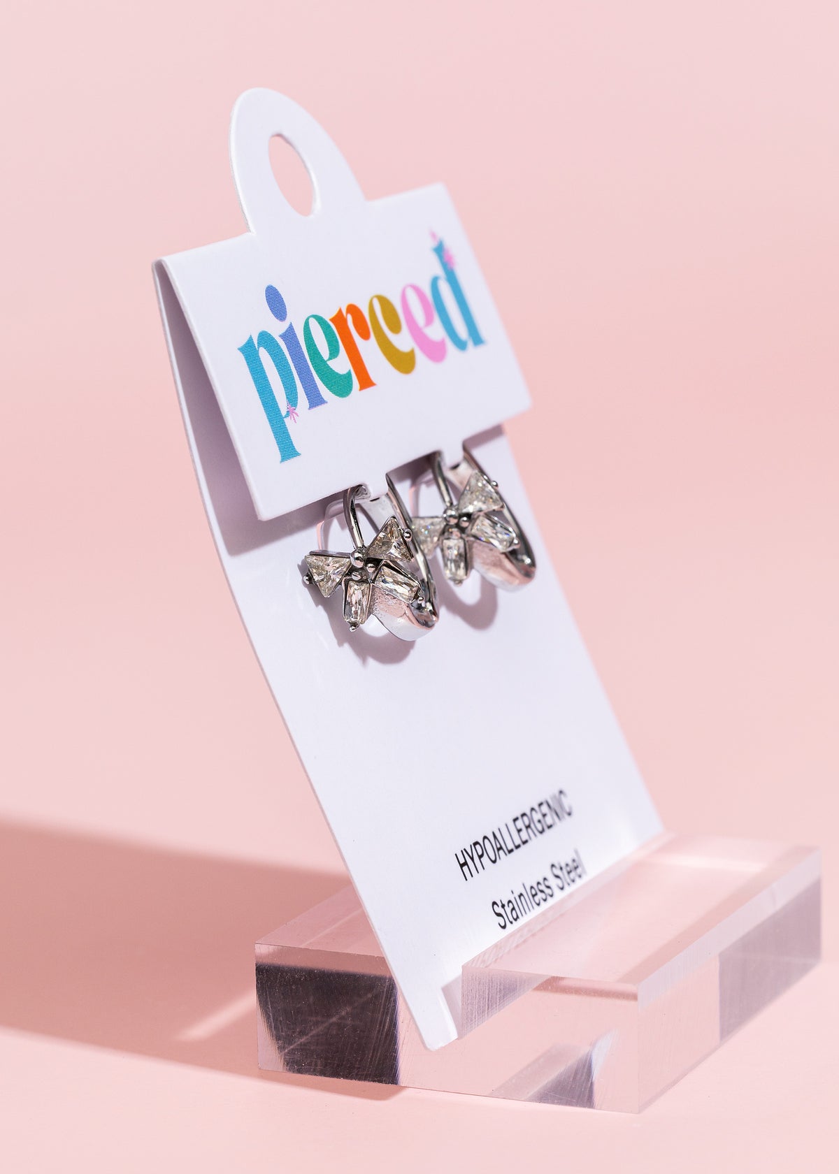 Silver Diamond Bow Huggies